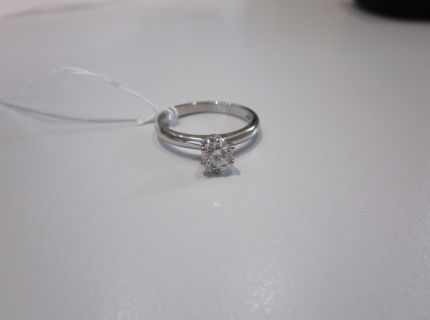 1 Ring mit Brillantsolitär WG
